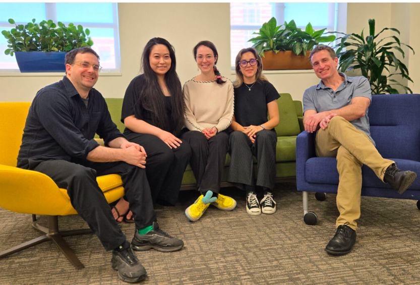 Sean Brenner/UCLA Humanities Todd Presner (right) with members of his AI and Cultural Heritage Lab, postdoctoral researcher Ulysses Pascal, technical lead Aileen Tang, and graduate student researchers Anna Bonazzi and Sophia Toubian